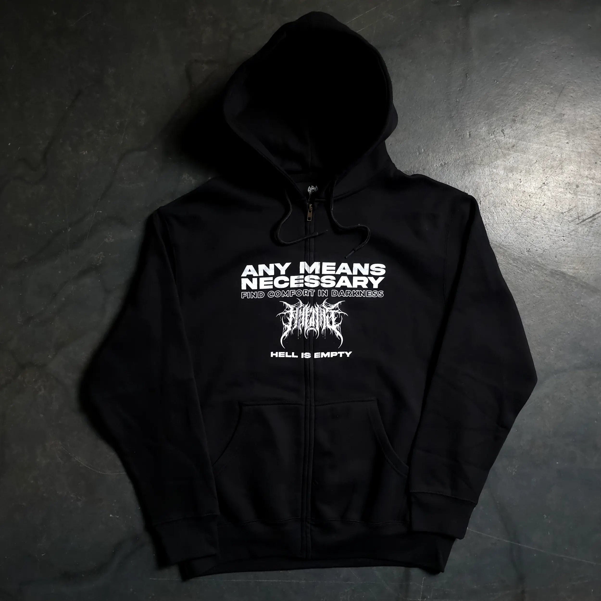 Black zip-up hoodie from Any Means Necessary Clothing with "Hell is Empty" graphic design on the front.