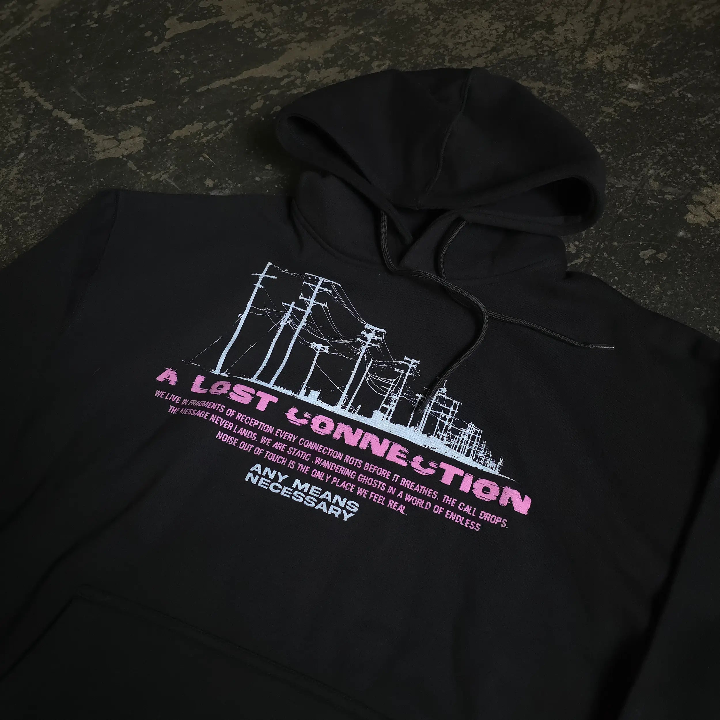 Any Means Necessary Clothing Lost Connection Pullover Hoodie, front view showcasing the black hoodie with logo design.