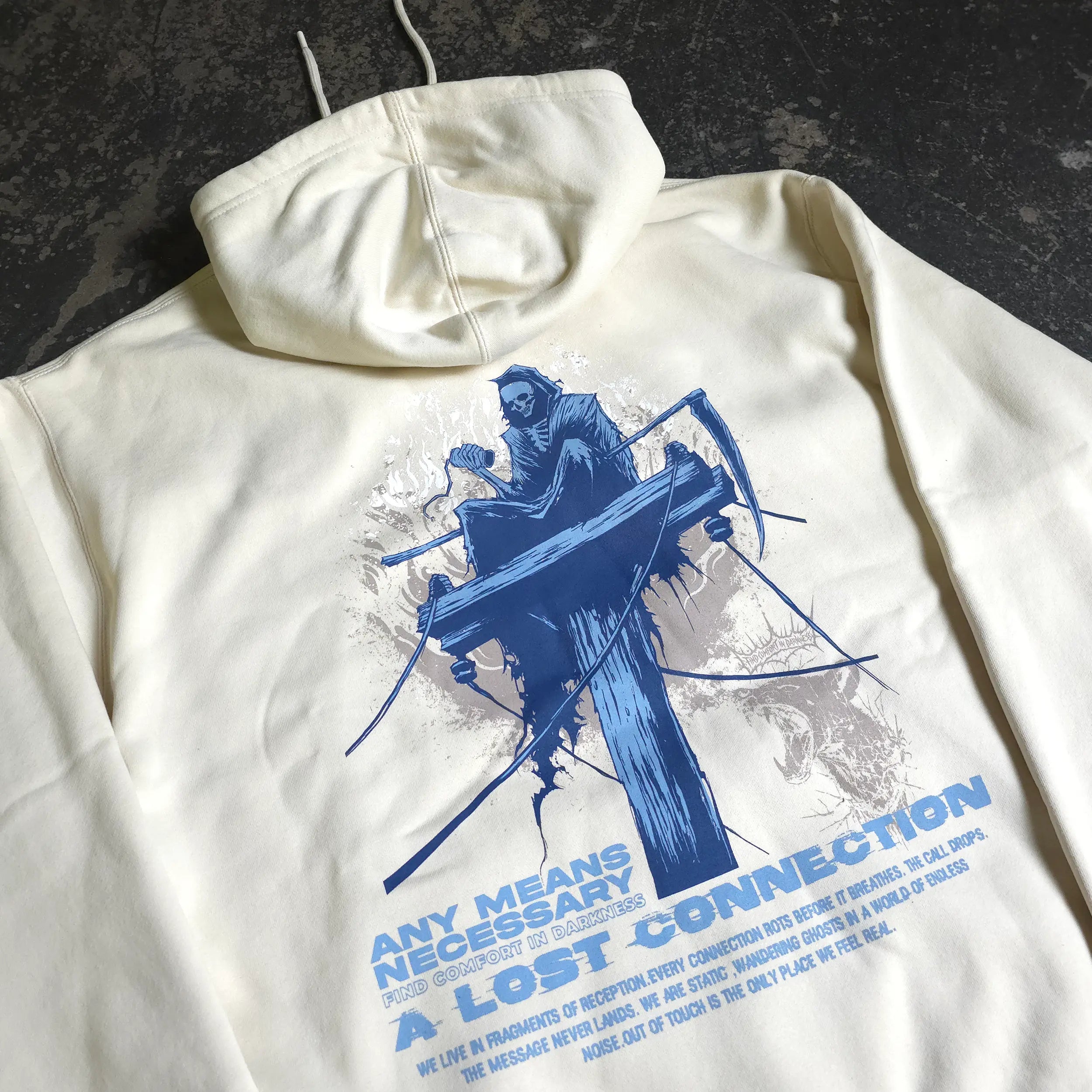 Bone-colored Lost Connection pullover hoodie by Any Means Necessary Clothing with a casual fit and printed design.