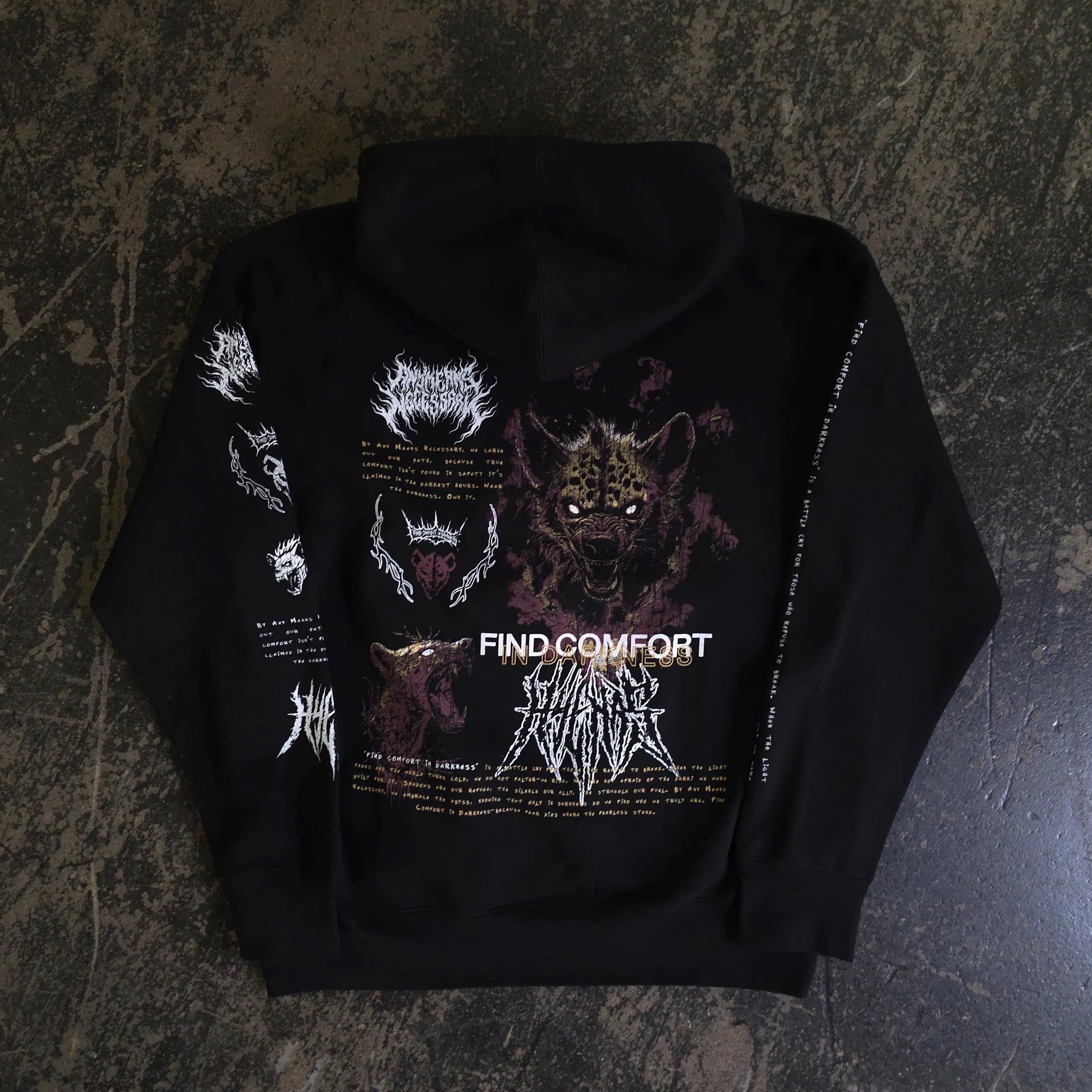 Black Mantra Pullover Hoodie by Any Means Necessary Clothing with front graphic and drawstring hood, casual and comfortable style.