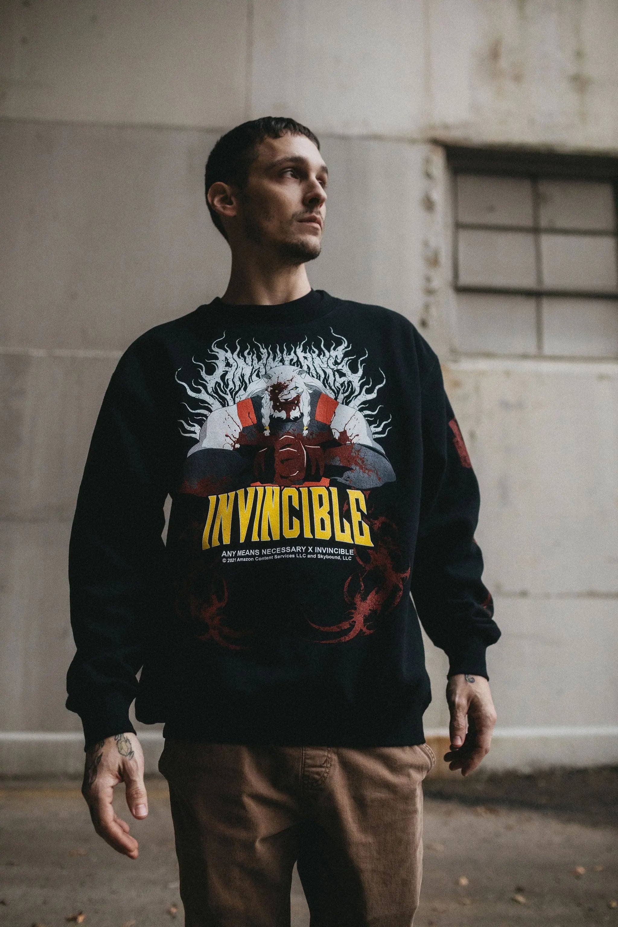 Black Thirst For Battle crewneck sweatshirt by Any Means Necessary Clothing, featuring bold graphic design and comfortable fit.