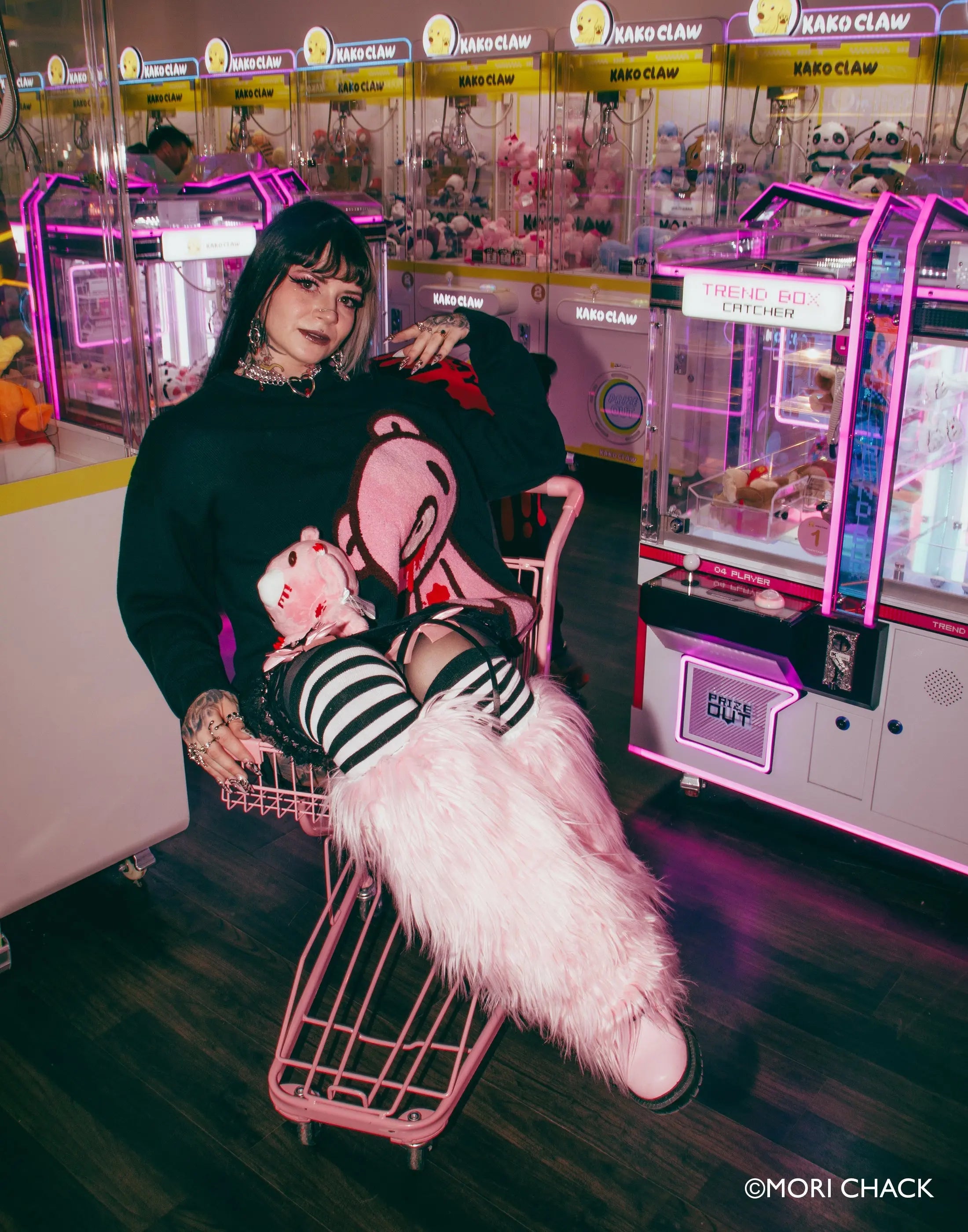 Big Gloomy Knit Sweater by Any Means Necessary Clothing, featuring a cozy, oversized design with detailed knit pattern.