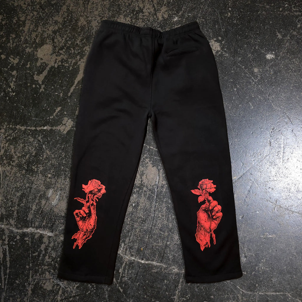 Black "When Death Comes" sweatpants by Any Means Necessary Clothing, featuring a relaxed fit and printed design.